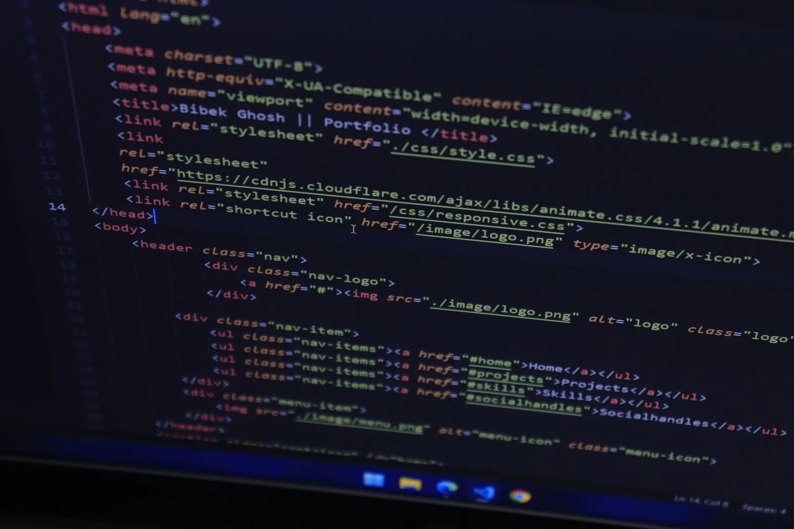 Website builder comparison interface on a dark monitor